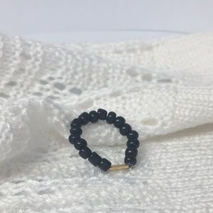 Black and gold seed bead ring